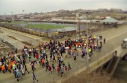 An aerial view of The Bridge Project kick-off march which took place on the historic James E. Groppi Unity Bridge Saturday April 12th, 2014