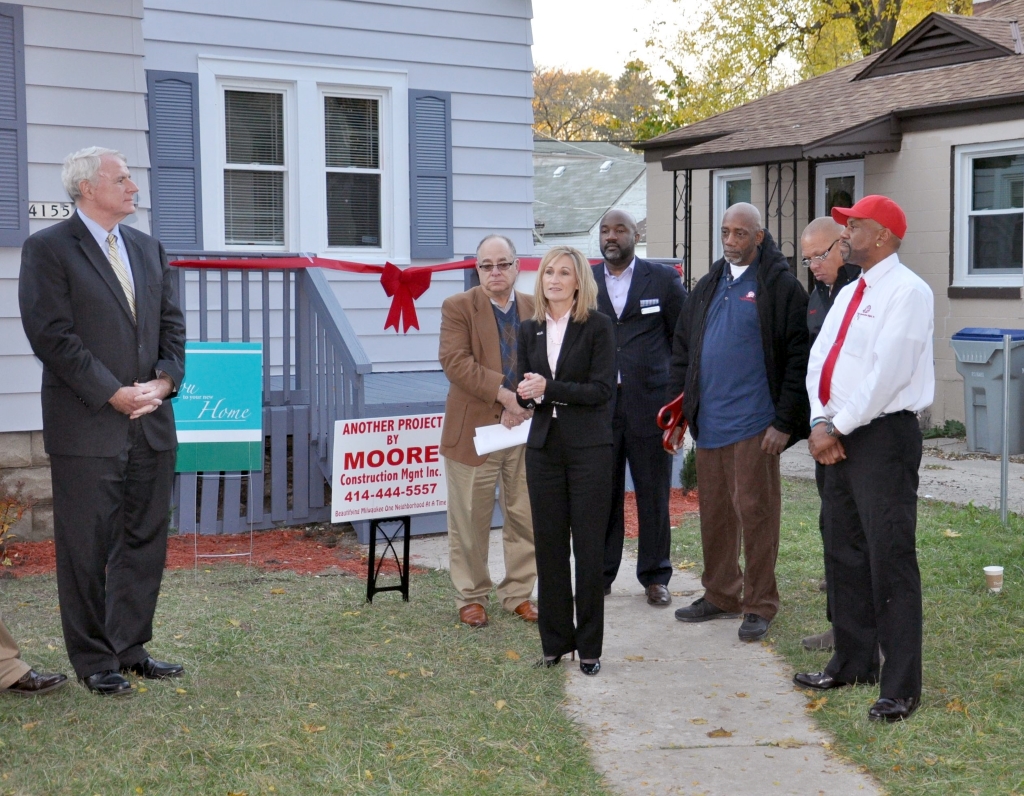 Ribbon-cutting ceremony for NW Impact’s first lease-to-own home. Photo by Susan Nusser.