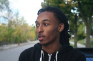 Davontae Thompson stands near the corner of 30th & Brown in Milwaukee’s Midtown neighborhood.