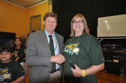 Ms. Milbrath with Green Bay Packers President and CEO Mark Murphy at an event at Greenfield Bilingual School