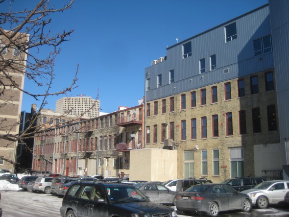 This image of the Commission Row buildings, on the left and viewed from the alley, shows where the proposed addition would be added. Photo by Michael Horne.