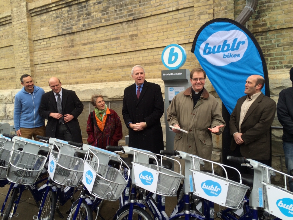 “Blessing of the Bublrs” Celebrates Bublr Bikes’ First Residential Station, on Brady Street