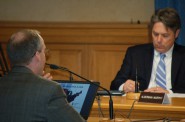 Alderman Michael Murphy listens to Rob Henken, president of the Public Policy Forum, present findings from a new report on marijuana laws. Photo by Edgar Mendez