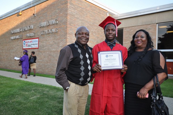 Morse Marshall graduate Anthony Eruchalu with his family; Eruchalu earned a scholarship to UW-Madison
