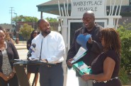 Competition winner Kelvin Haydon (second from right) shows his award certificate as (from left) Sakuri Fears, Alderman Russell Stamper and BID Executive Director Jacqueline Ward look on. Photo by Andrea Waxman.