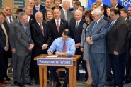 Governor Scott Walker Signing Right to Work Legislation. Photo from Governor's Office.