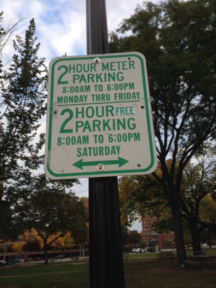 Parking Sign with 'FREE' Sticker. Photo courtesy of the DNA.