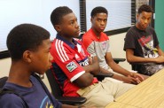 From left, Memorial High School students William Lemkuil, Demitrius Kigeya, Odoi Lassey and Robert Bennett say they face racial stereotypes at school. Photo by Joseph W. Jackson III of the Wisconsin Center for Investigative Journalism.