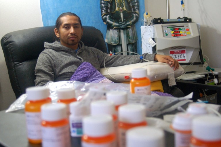 Jonathon Morales, 30, prepares for his dialysis treatment. Photo by Edgar Mendez.