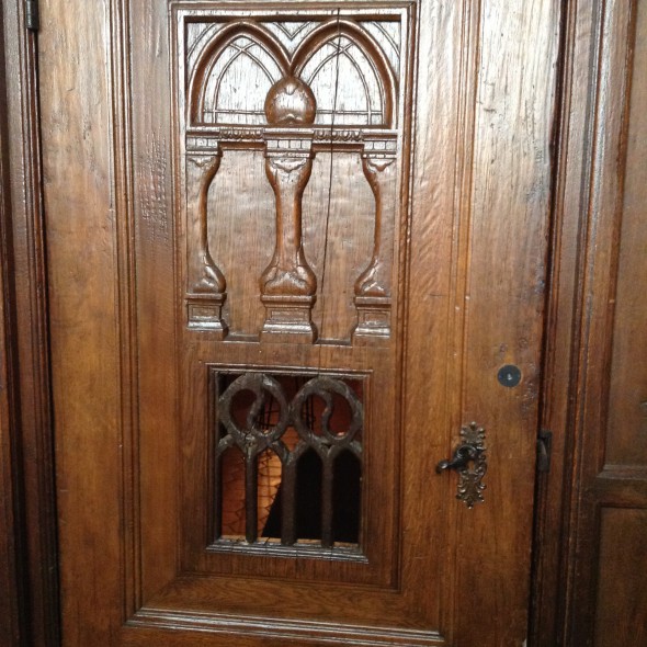 Carved wooden doors. Photo by Cari Taylor-Carlson.