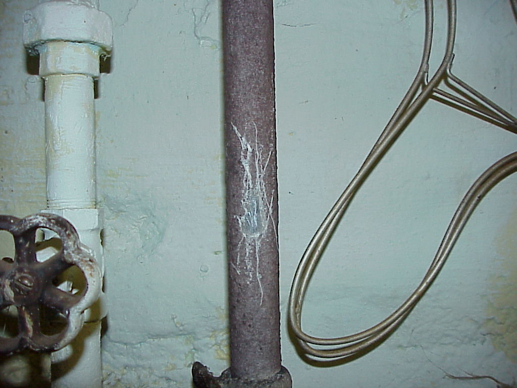 To check if your home has lead pipes, locate the pipe that leads into your home and connects to the water meter, often coming up through the basement floor. Use a flathead screwdriver to scratch the pipe and remove any accumulated dirt or deposits. If the pipe is shiny metal under the scratched area, it is lead. If it is copper-colored, it is copper. And if it remains dull, it is galvanized steel. Also, a magnet will stick to steel, but it will not stick to lead. Photo from the Madison Water Utility.