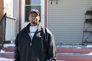 New homeowner Randy Jones stands outside of his Milwaukee Rising home. (Photo by Sue Vliet)