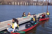Volunteers collect garbage in the water using canoes during the annual event. Photo courtesy of Milwaukee Riverkeeper.