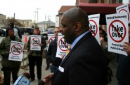 Demond Means speaks to reporters before an OSPP advisory committee meeting. Photo by Jabril Faraj.