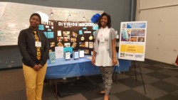 North Division students Qiaira Matthews (left) and Tatiana Loyd (right) showcase their mobile app -- which is now one of six winners in a national competition -- at the MPS STEM Partners Spring Student Showcase. Photo courtesy of MPS.