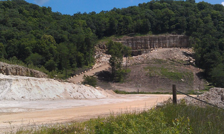 An entrance on the west end of the Pattison Sand Co. site in rural Clayton County, Iowa, is seen in 2014. The company’s mining facility in Iowa has received more workplace violations than any other industrial sand mine in the United States, according to data from the Mine Safety and Health Administration. Photo by Lyle Muller of IowaWatch.