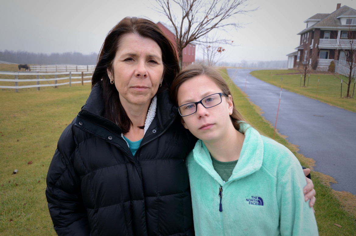 About 12 years ago, Samantha Treml, right, then six months old, fell ill after being bathed in well water tainted by manure spread on a nearby frozen farm field. The Tremls moved from their Kewaunee County home after that incident, saying they no longer trusted the quality of their water. Recent tests in Kewaunee County funded by the state Department of Natural Resources found 34 percent of wells had unsafe levels of coliform, E. coli or nitrate. Photo by Tad Dukehart for the Wisconsin Center for Investigative Journalism.