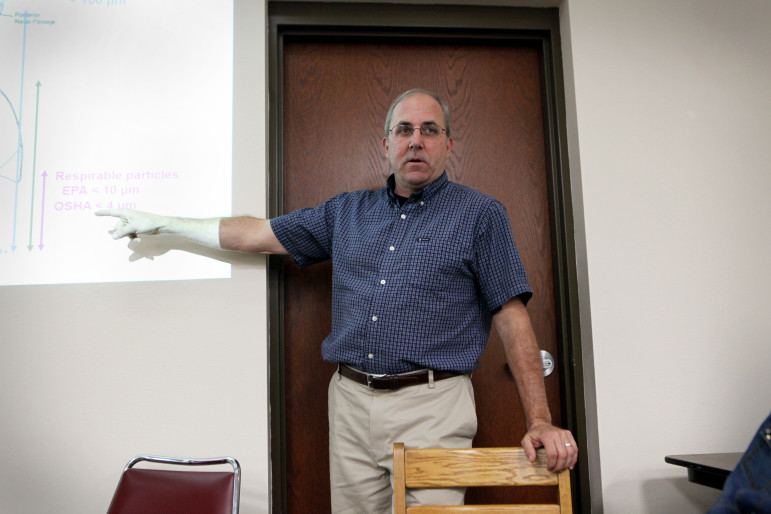 Patrick O’Shaughnessy, a professor of occupational and environmental health in the University of Iowa engineering college, speaks at a public meeting of the Clayton County Mine Reserve Expansion Study Committee in Elkader, Iowa. O’Shaughnessy said although residents living around Pattison Sand Co.’s proposed expansion face a low risk of inhaling airborne silica particles from the mine, the mine’s overall record should also be considered. Photo by Coburn Dukehart of the Wisconsin Center for Investigative Journalism.