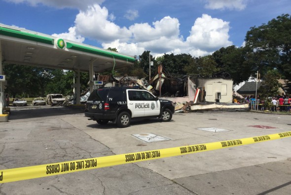 Gas station at Sherman and Burleigh was set on fire. Photo by Jeramey Jannene.
