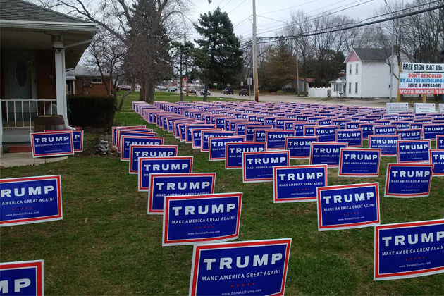 This picture, of a yeard in West Carrollton, Ohio, is not doctored, as many assumed when it went viral last spring. It was real. As was the Trump white working-class groundswell. Photo by Alec MacGillis of ProPublica.