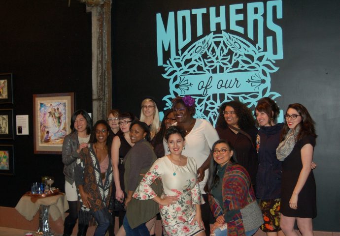 Artists from the From Here to her Collective gather for a picture after celebrating the Mothers of Our Nations exhibit at the Milwaukee Opening Party. Photo by Brittany Carloni.