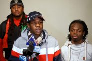 Sedan Smith (center), brother of Sylville Smith, speaks at a press conference at Inspired Word Ministries, 3410 W. Burleigh St., while cousin Thaddeus Ashford (right) and activist Vaun Mayes (left) look on. Photo by Adam Carr.