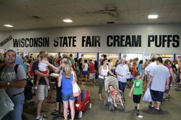 The cream puffs draw a large crowd at the 2014 Wisconsin State Fair. Photo by Jeramey Jannene.