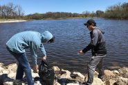 James Niland, left, and Kenneth Banting volunteered through Marquette University’s Hunger Clean-Up program to pick up trash at Lincoln Park. Photo by Camille Paul.