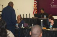 A defendant comes before Municipal Judge Valarie Hill in a meeting room converted into a courtroom at Greater New Birth Church, 8237 W. Silver Spring Drive. Photo by Edgar Mendez.