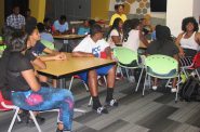 Teenagers at the Mary Ryan Boys & Girls Club gather in the newly renovated center. Photo by Lydia Slattery.