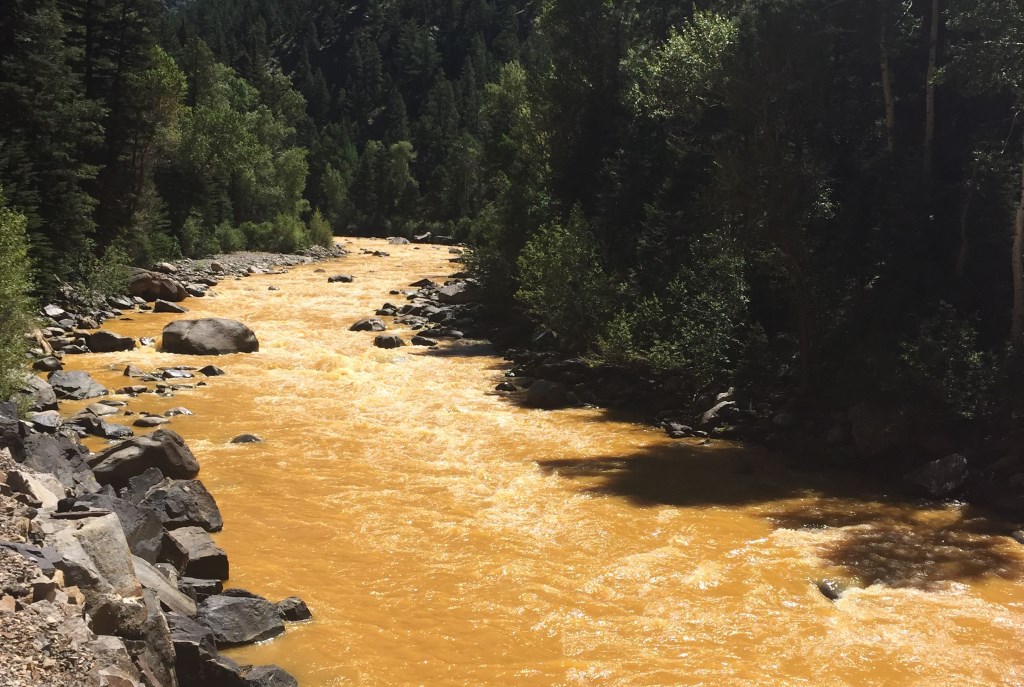 The Animas River between Silverton and Durango in Colorado, USA, within 24 hours of the 2015 Gold King Mine waste water spill. Photo by Riverhugger (Own work) [CC BY-SA 4.0 (http://creativecommons.org/licenses/by-sa/4.0)], via Wikimedia Commons