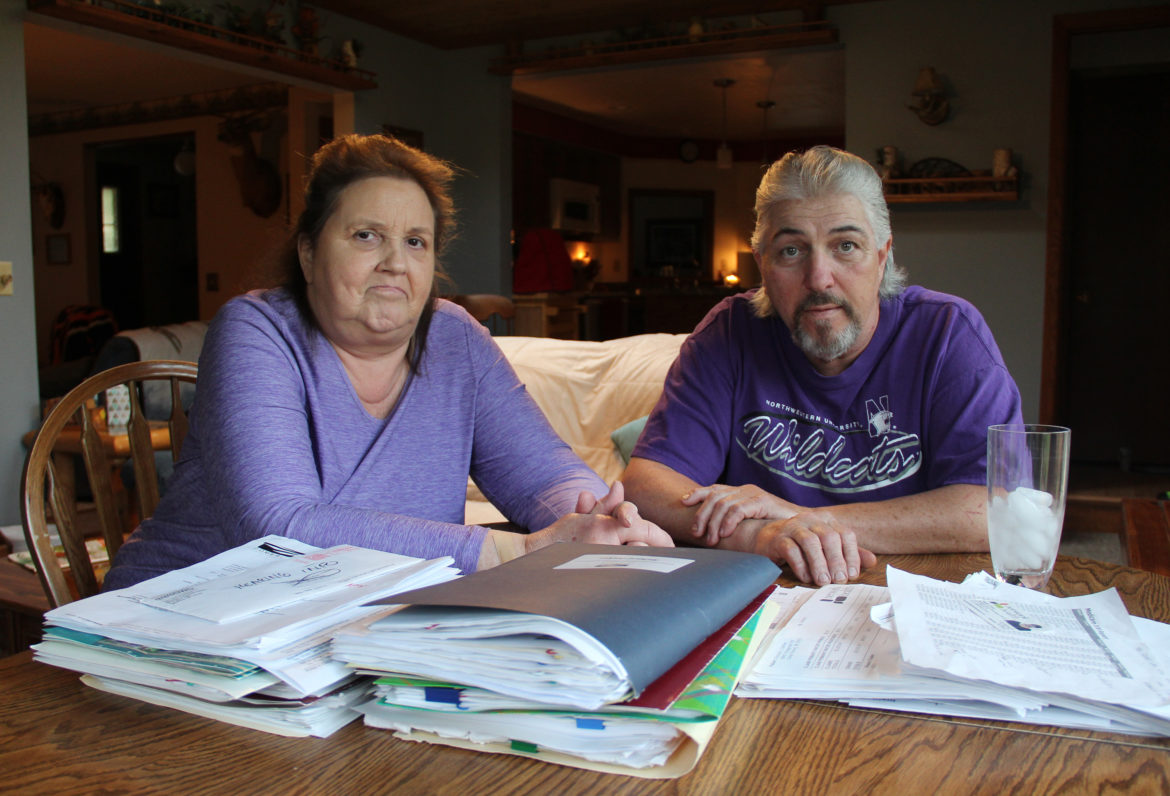 Richard Decker worked for more than 35 years for Kohler Co. before a brain injury sustained at work in 2010 forced him to stop working. Decker, seen here with his wife, Cathy, has problems with short-term memory and severe pain. Kohler has refused to provide him with long-term support under worker's compensation for the injury, and a state commission sided with the company. Photographed May 5, 2017 at the Deckers' home near Cedar Grove, Wis. Photo by Alexandra Hall/WPR/Wisconsin Center for Investigative Journalism.