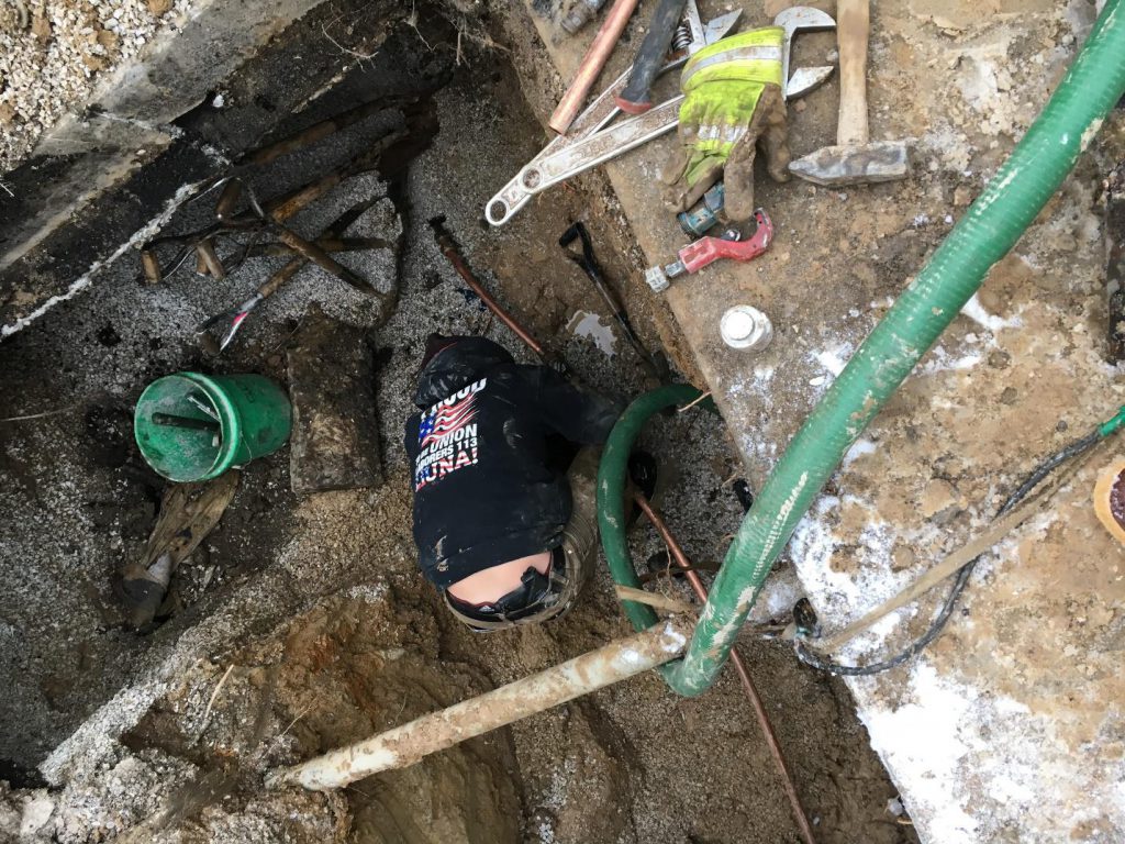 American Sewer Services Employee with Gun. Photo from City of Milwaukee.
