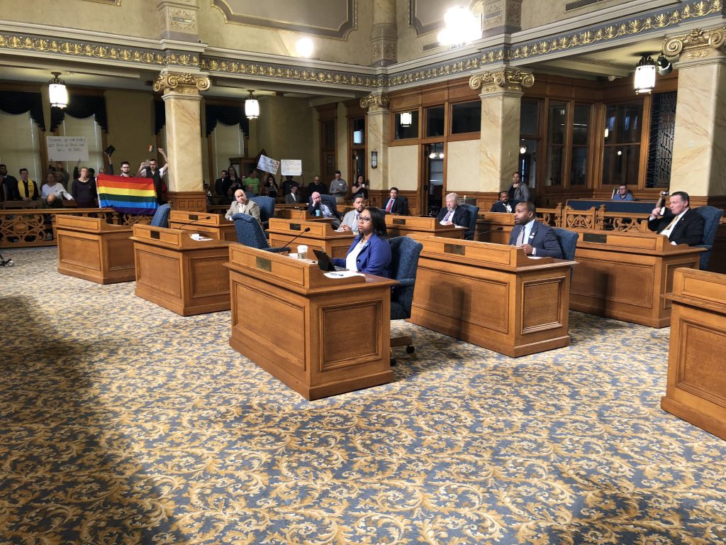 Ald. Cavalier Johnson (speaking from desk in second row) describes his conversion therapy ban. Photo by Jeramey Jannene.