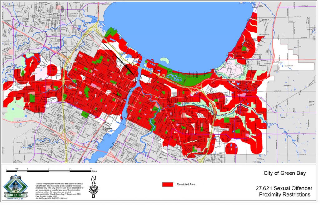 Green Bay, like more than 150 other municipalities in Wisconsin, maintains residency restrictions for sex offenders. Green Bay’s ordinance requires that convicted sex offenders live at least 1,500 feet away from schools, day-care centers, parks or licensed entertainment facilities. As the red shading in the photo indicates, such restrictions have left most of the city off-limits for sex offenders to live. Map from the City of Green Bay.