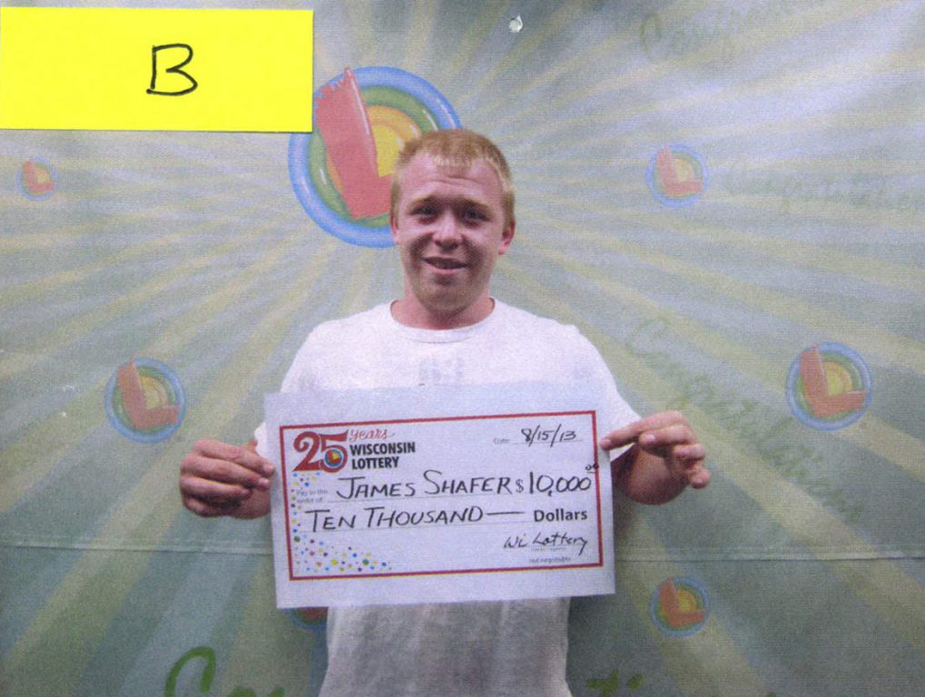 James Shafer, from Eau Claire, Wis., poses with a check for $10,000 after cashing in a stolen winning ticket for Wisconsin’s “20X The Money” scratch-off game. Justin Brummond, Shafer’s brother, promised to pay him $500 for cashing the stolen ticket. The brothers and a store clerk were charged and convicted in connection with the theft. Photo from the Wisconsin Lottery.