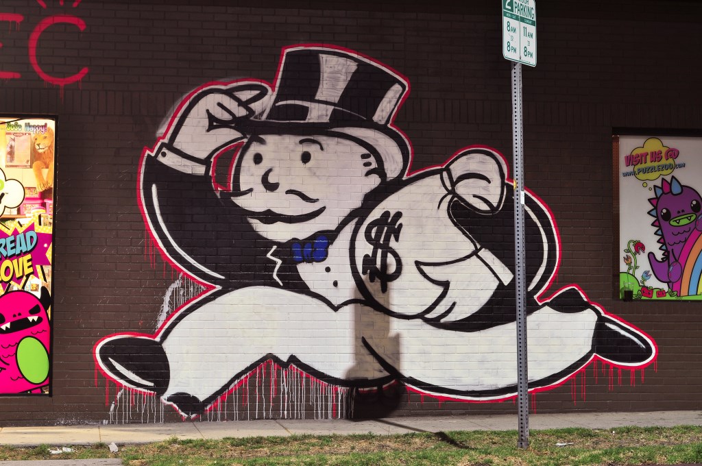 Mr. Money Bags mural. Photo by aisletwentytwo. (CC BY 2.0)