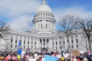 After Gov. Scott Walker unveiled the Wisconsin budget repair bill in February 2011, which sought to end collective bargaining for most public sector unions, thousands of protesters took to the streets of Madison in opposition. Protestors are seen here in front of the Wisconsin State Capitol on March 12, 2011, a day after the bill was passed. A recent poll found that over two-thirds of Democrats, Republicans and independents feel very or somewhat concerned about the current state of American democracy. Photo by Richard Hurd. (CC BY 2.0)