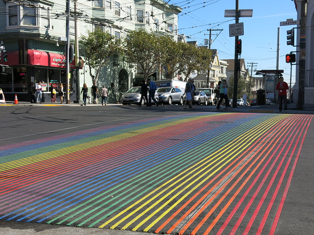 Rainbow Flag crossing in San Franciso. Photo by Burkhard Mücke [CC BY-SA 4.0 (https://creativecommons.org/licenses/by-sa/4.0)], from Wikimedia Commons