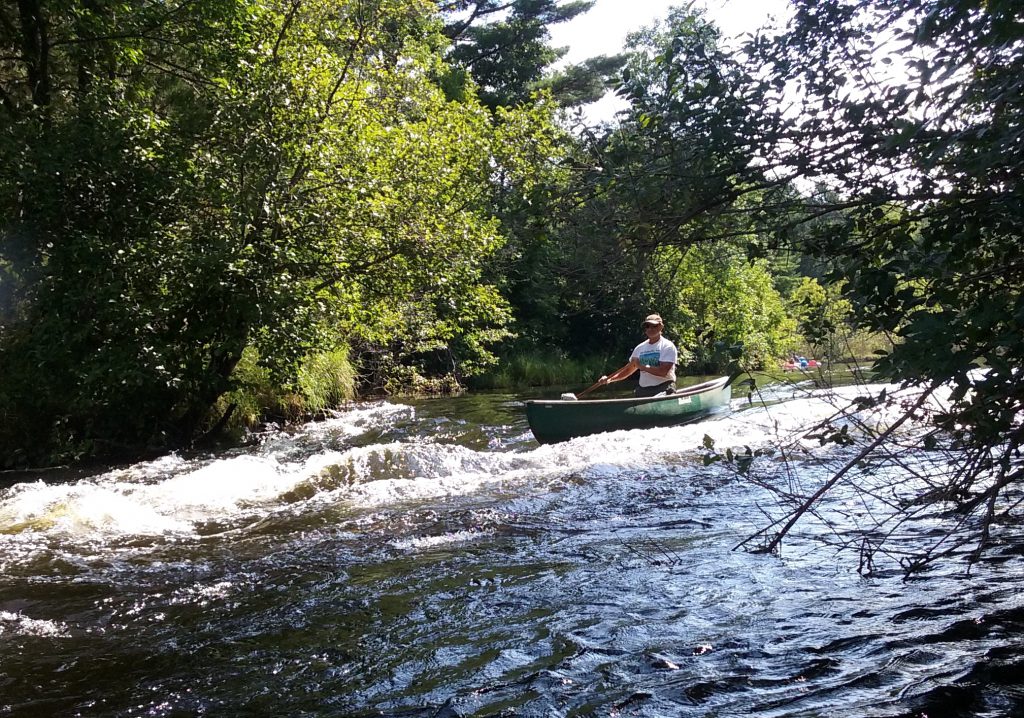 Spencer Black paddles the Namekagon River. Photo by Daryl Hinz.