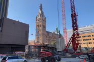BMO Tower rising in front of Milwaukee City Hall. Photo by Jeramey Jannene.