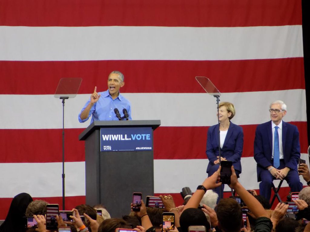 Former President Barack Obama appeared at Milwaukee rally on Friday with Democratic U.S. Senate. candidate Tammy Baldwin and gubernatorial candidate Tony Evers. Photo by Ximena Conde/WPR.