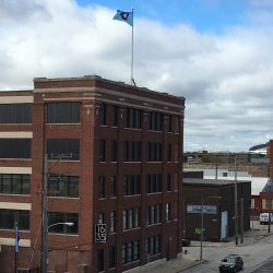 Milwaukee Brewers flag flying over Guardian Fine Art Services, 1635 W. Saint Paul Ave. Photo courtesy of Guardian Fine Art Services.