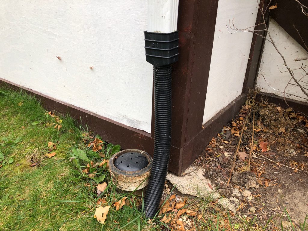 Disconnected downspout in Bay View. Photo by Jeramey Jannene.