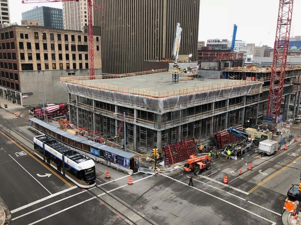The Hop rolls by the BMO Tower construction site. Photo by Jeramey Jannene.