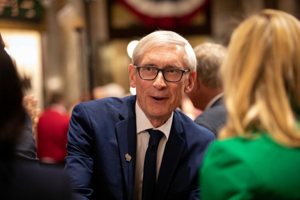 Gov. Tony Evers greets members of the Assembly and Senate after giving his first State of the State address in Madison, Wisconsin, at the state Capitol building on Jan. 22, 2019. Photo by Emily Hamer/Wisconsin Center for Investigative Journalism.