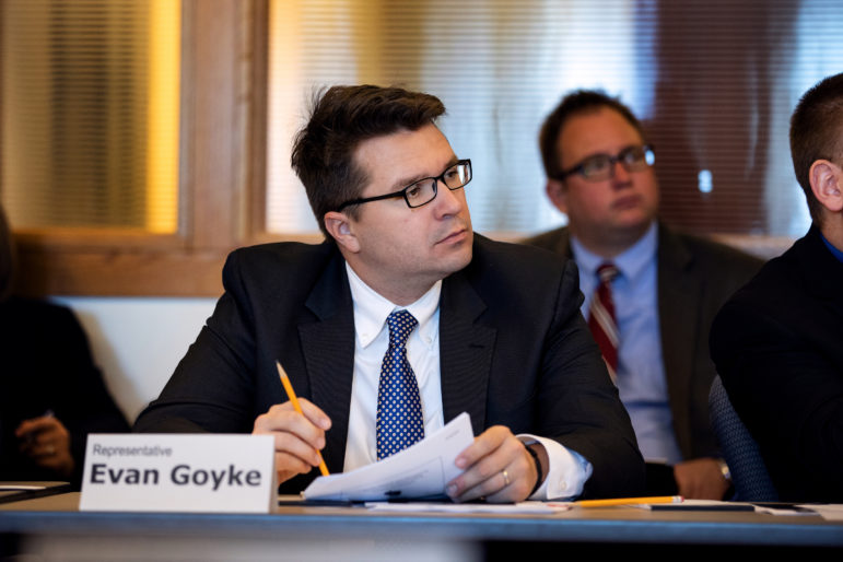Rep. Evan Goyke, D-Milwaukee, member of the Legislative Study Committee on Bail and Conditions of Pretrial Release, is working on possible legislation to limit or eliminate cash bail in Wisconsin. Committee members are scheduled to vote Jan. 29 on whether to recommend Goyke’s proposal and other changes in pretrial procedures to the state Legislature. Goyke is seen here at an Oct. 16, 2018 meeting. Photo by Emily Hamer / Wisconsin Center for Investigative Journalism.
