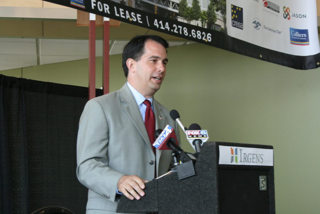 Scott Walker speaking at the 833 East groundbreaking event in downtown Milwaukee in 2014. File photo by Jeramey Jannene.