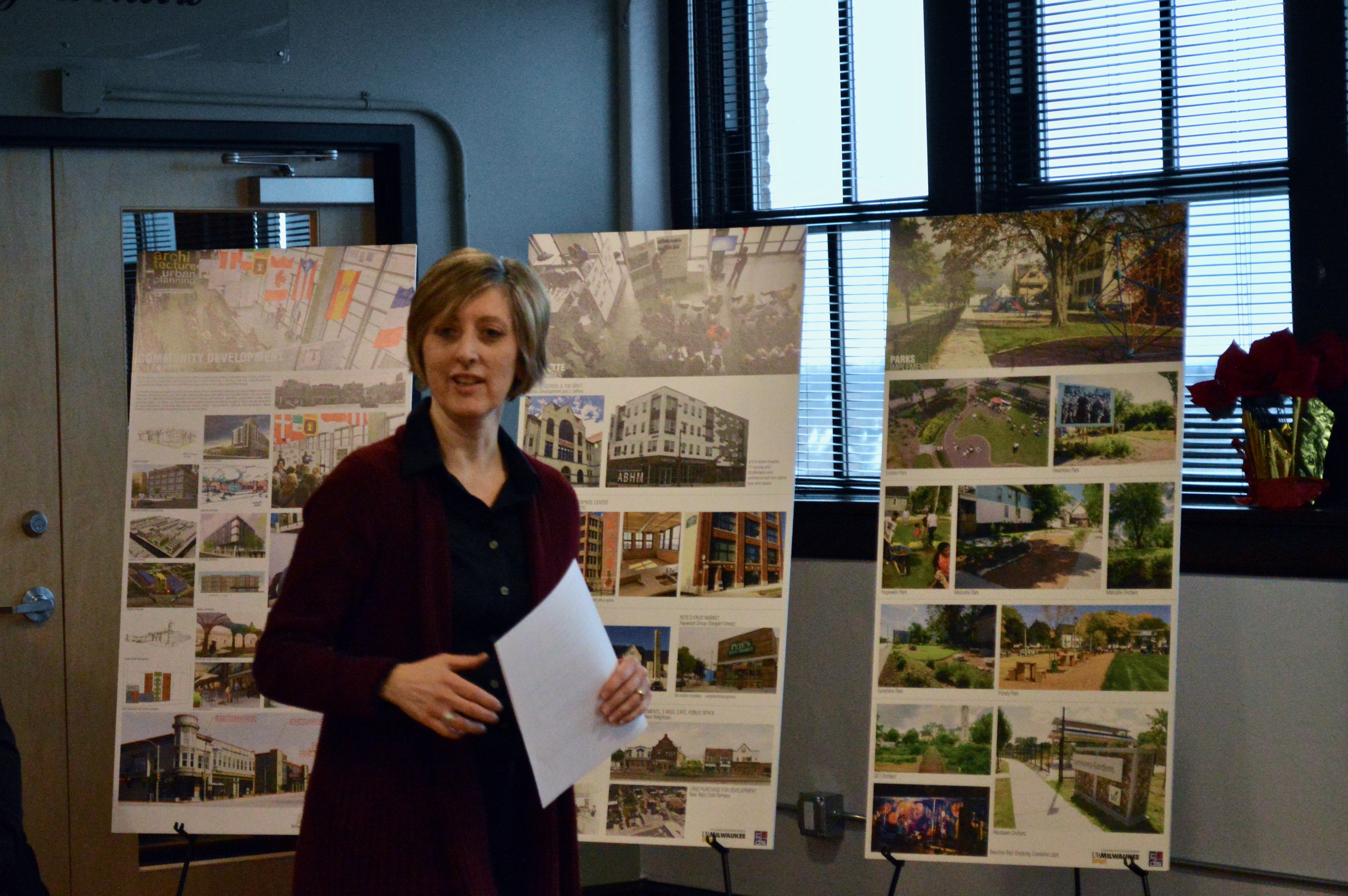 Carolyn Esswein explains her process of charrette, where she brings together residents, funders and designers for community-based development planning. Photo by Analise Pruni/NNS.