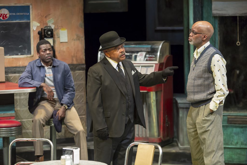 Sterling (Chiké Johnson), West (Doug Brown) and Holloway (Michael Anthony Williams) in Milwaukee Repertory Theater’s production of August Wilson’s Two Trains Running April 16 – May 12, 2019. Photo by Mikki Schaffner.